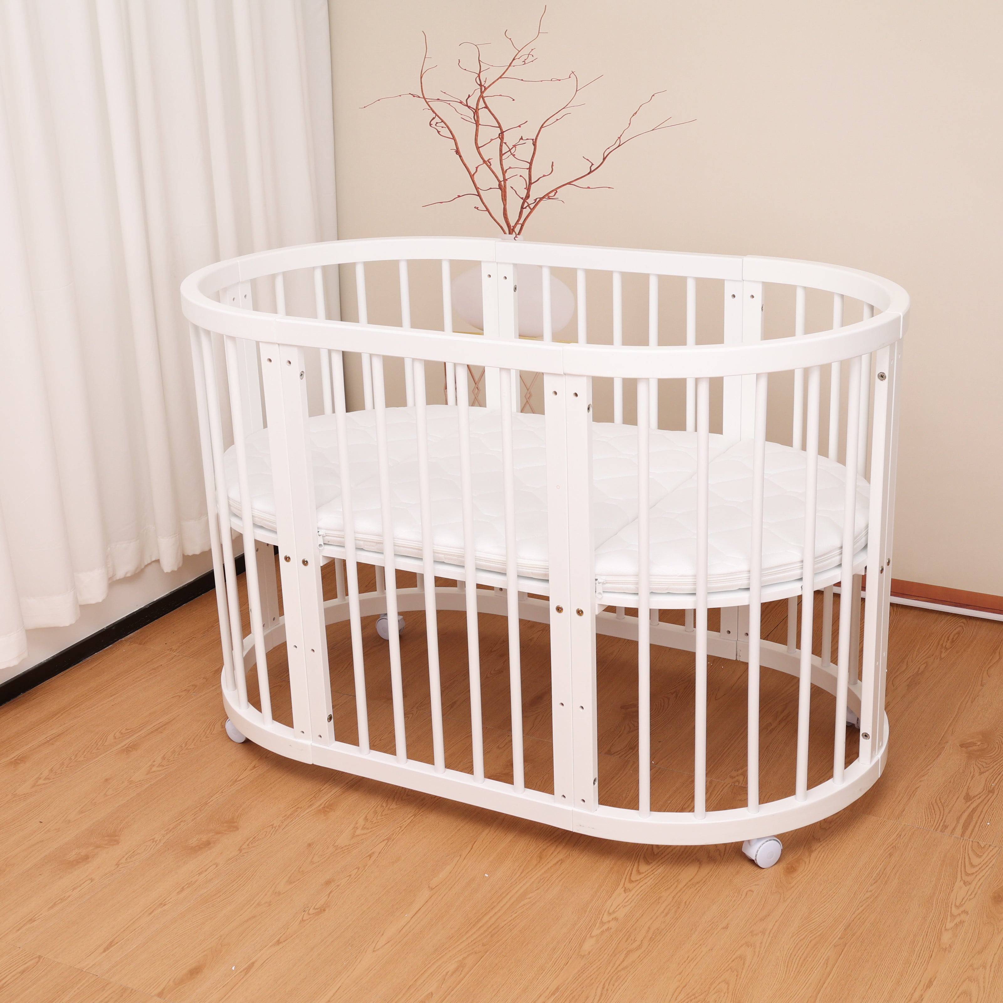 Minigo Bird Nest 4-in-1 – עריסה ומיטת תינוק מעץ  מאיה לבן כולל מזרנים