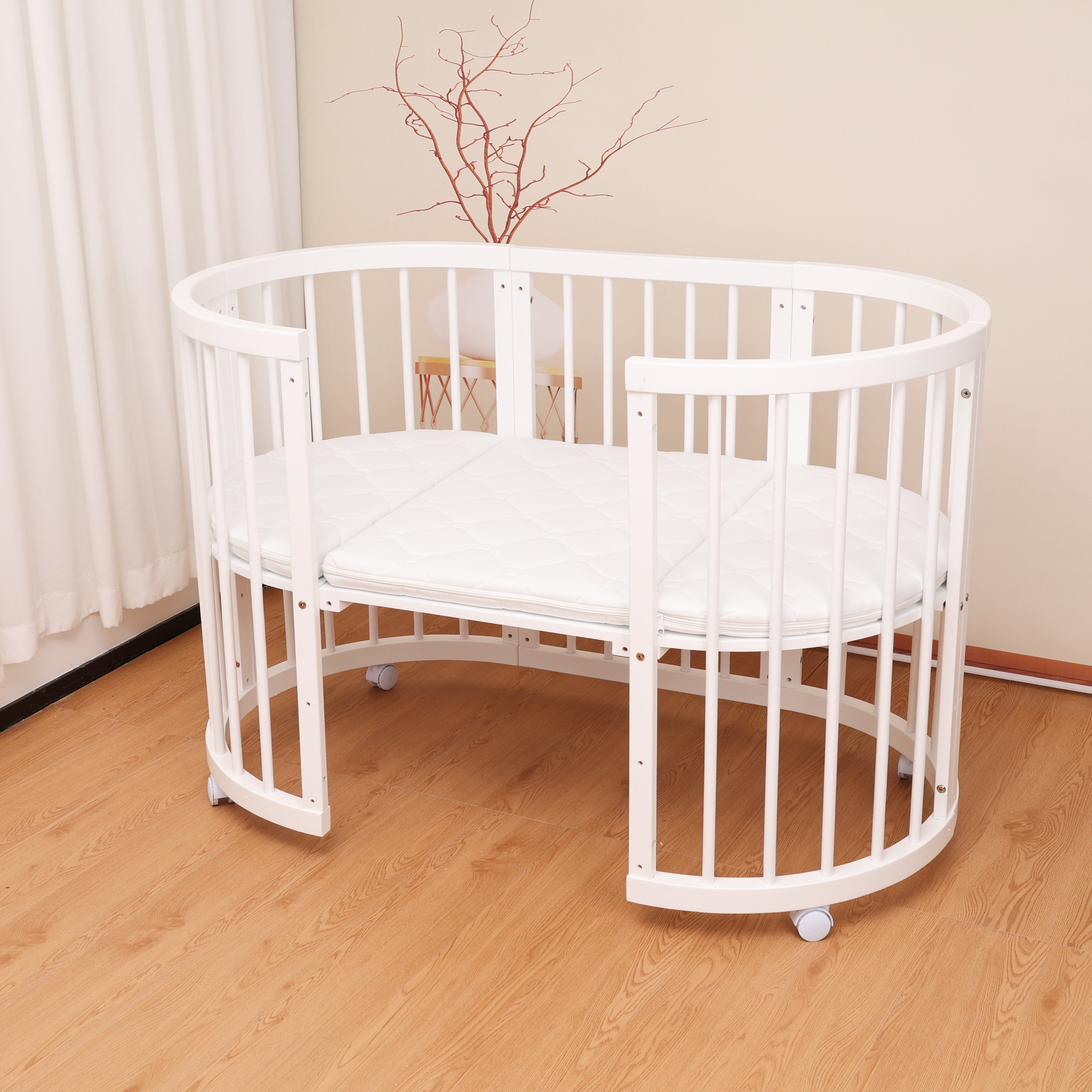 Minigo Bird Nest 4-in-1 – עריסה ומיטת תינוק מעץ  מאיה לבן כולל מזרנים