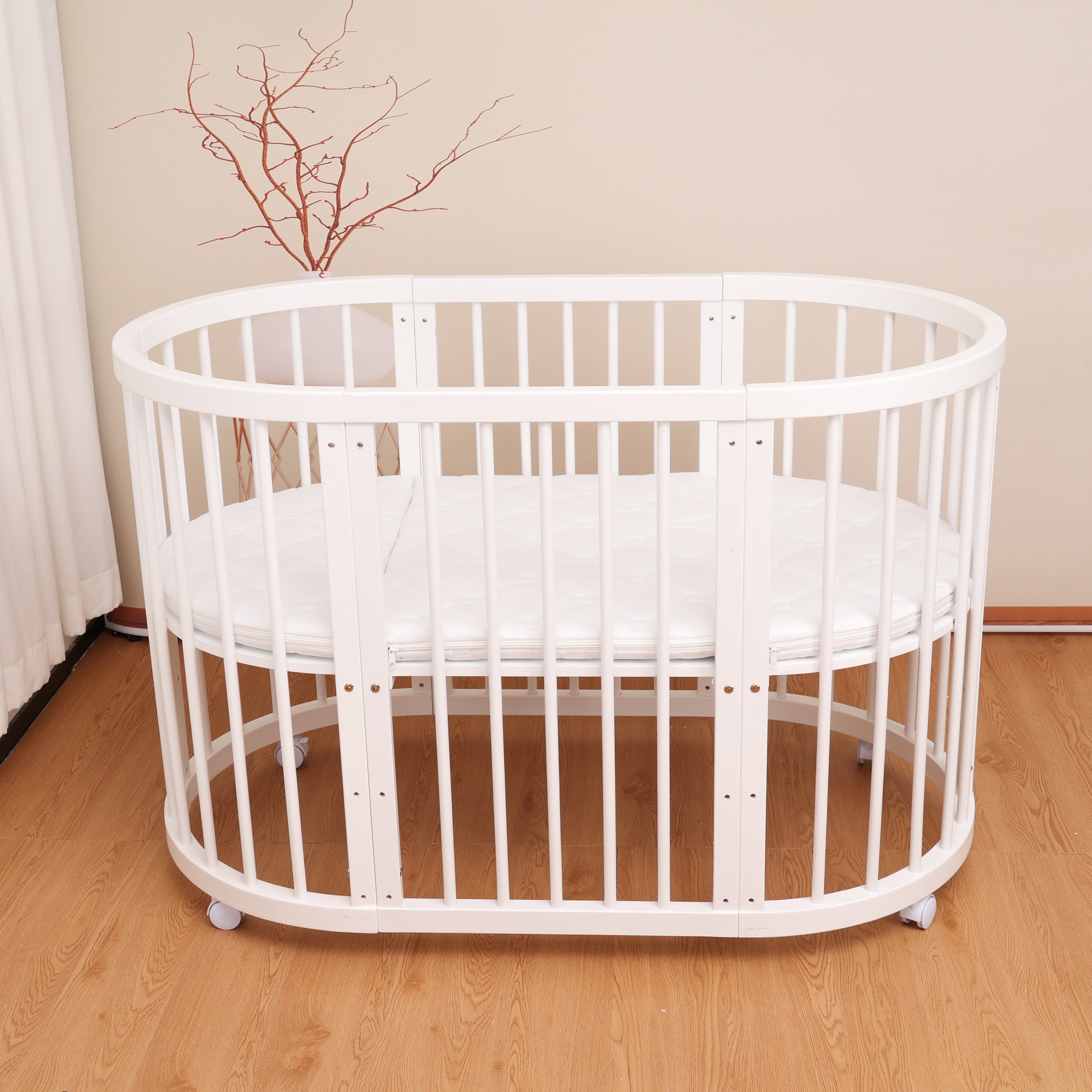 Minigo Bird Nest 4-in-1 – עריסה ומיטת תינוק מעץ  מאיה לבן כולל מזרנים