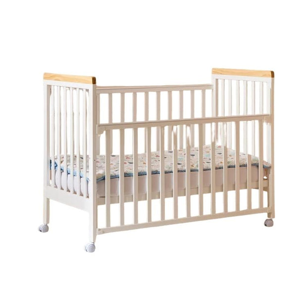מיטת תינוק מיניגו מעץ צבע לבן שילוב עץ